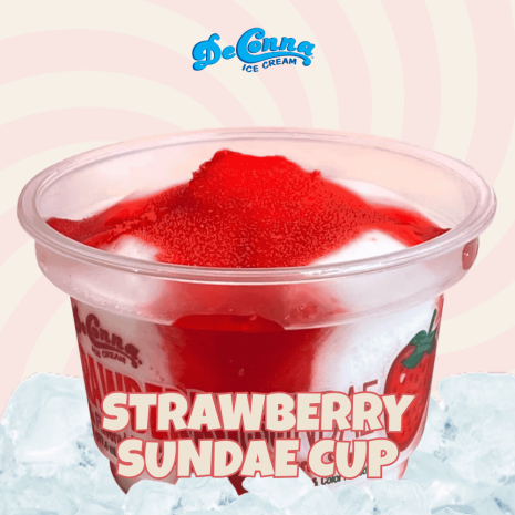 Strawberry-Sundae-Cup-DeConna Strawberry sundae in a clear plastic cup with red topping, surrounded by ice, and bold 'STRAWBERRY SUNDAE CUP' text overlaid toward the front.