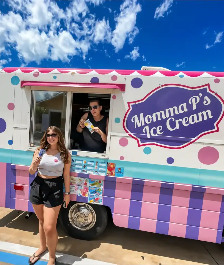 Momma P's Ice Cream Truck, a DeConna Vendor - DeConna Ice Cream Momma P's Ice Cream truck in Florida with the operator at the window and a customer holding an ice cream bar